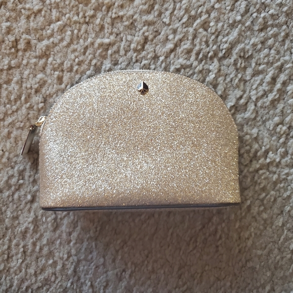 kate spade Handbags - Kate spade Travel Bag Gold Glitter